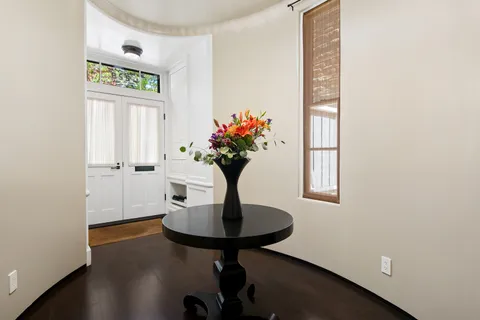 a vase of flowers sitting on a table