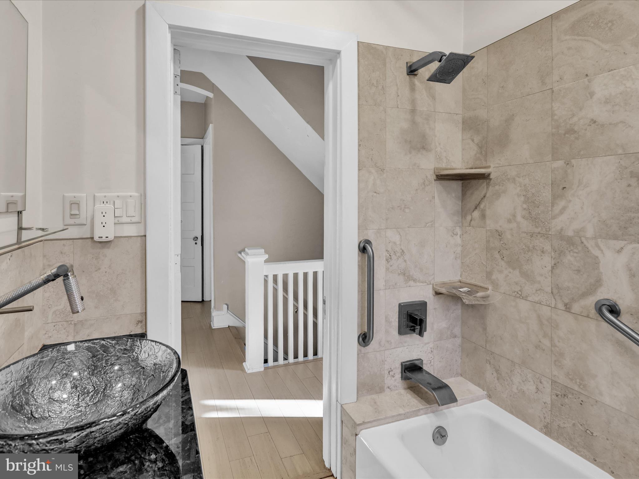 1315 Cleveland Avenue Wyomissing, PA 19610 - Photo 21 of 43 a bathroom with a tub sink and toilet