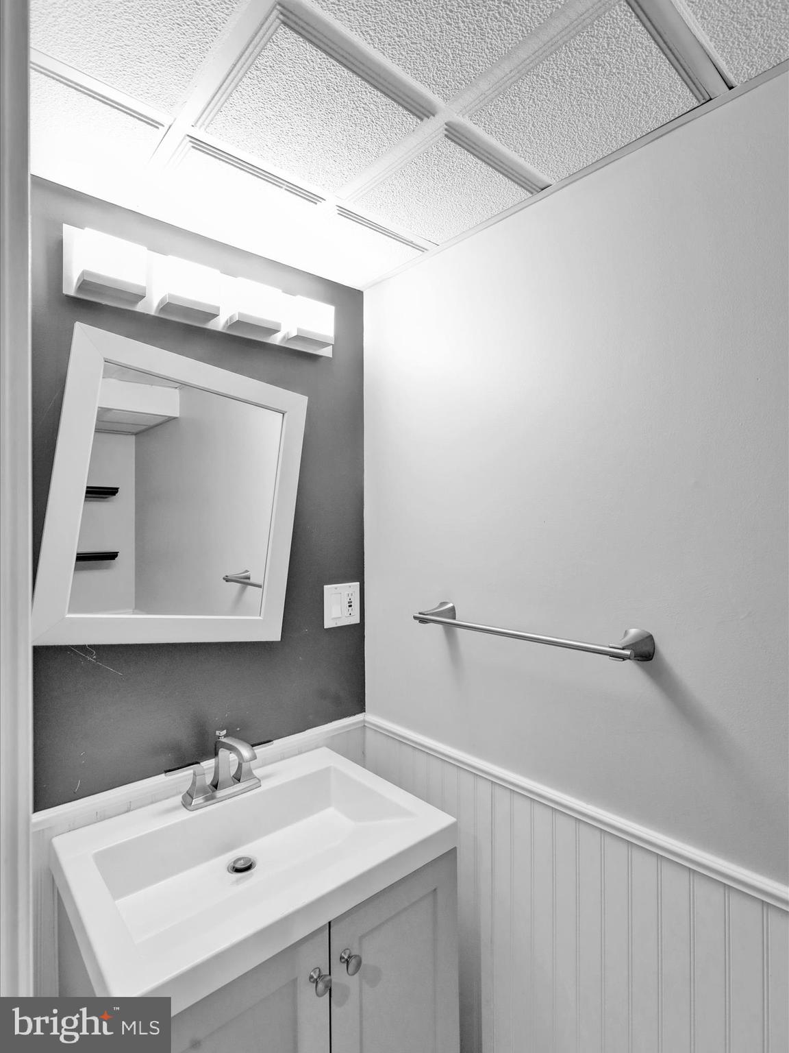 1315 Cleveland Avenue Wyomissing, PA 19610 - Photo 33 of 43 a bathroom with a sink vanity and mirror
