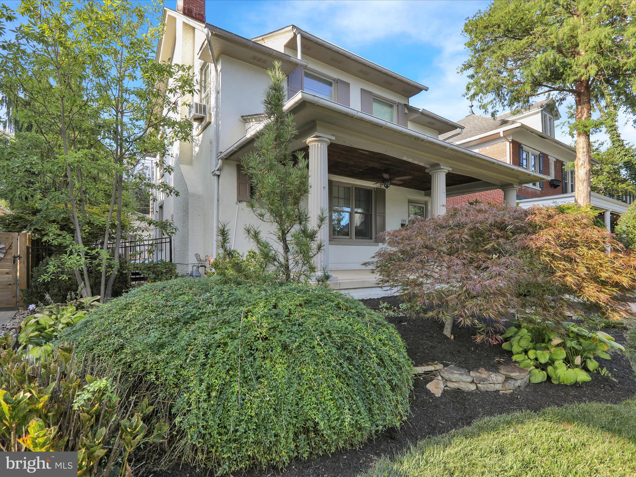 1315 Cleveland Avenue Wyomissing, PA 19610 - Photo 37 of 43 front view of a house with a garden