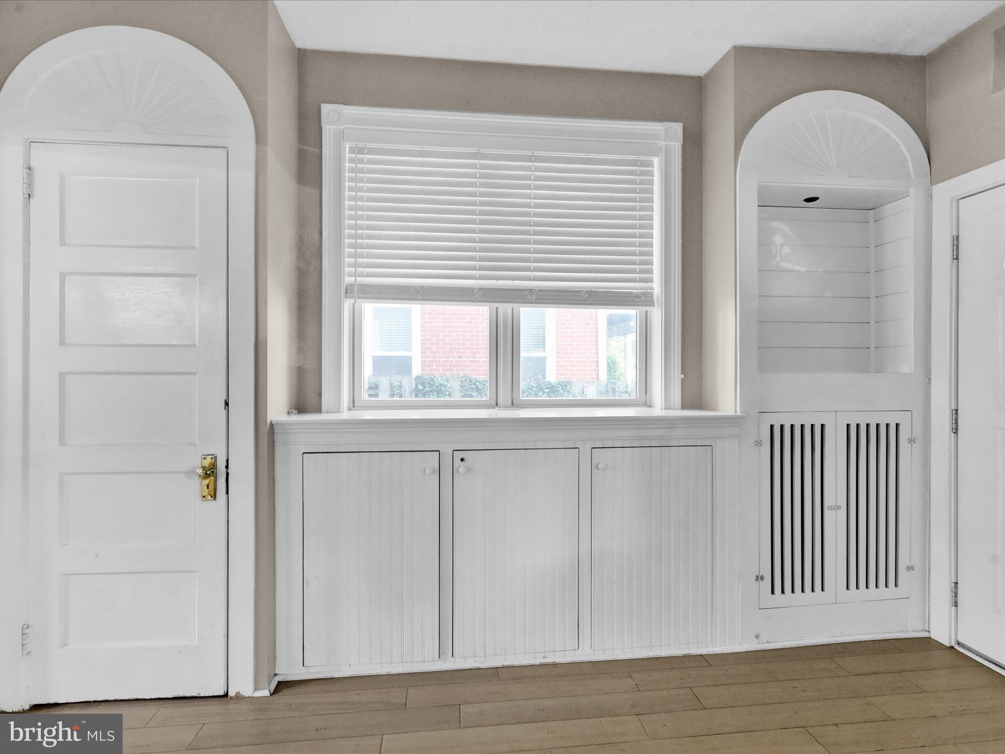 1315 Cleveland Avenue Wyomissing, PA 19610 - Photo 7 of 43 a view of an empty room with wooden floor and a window