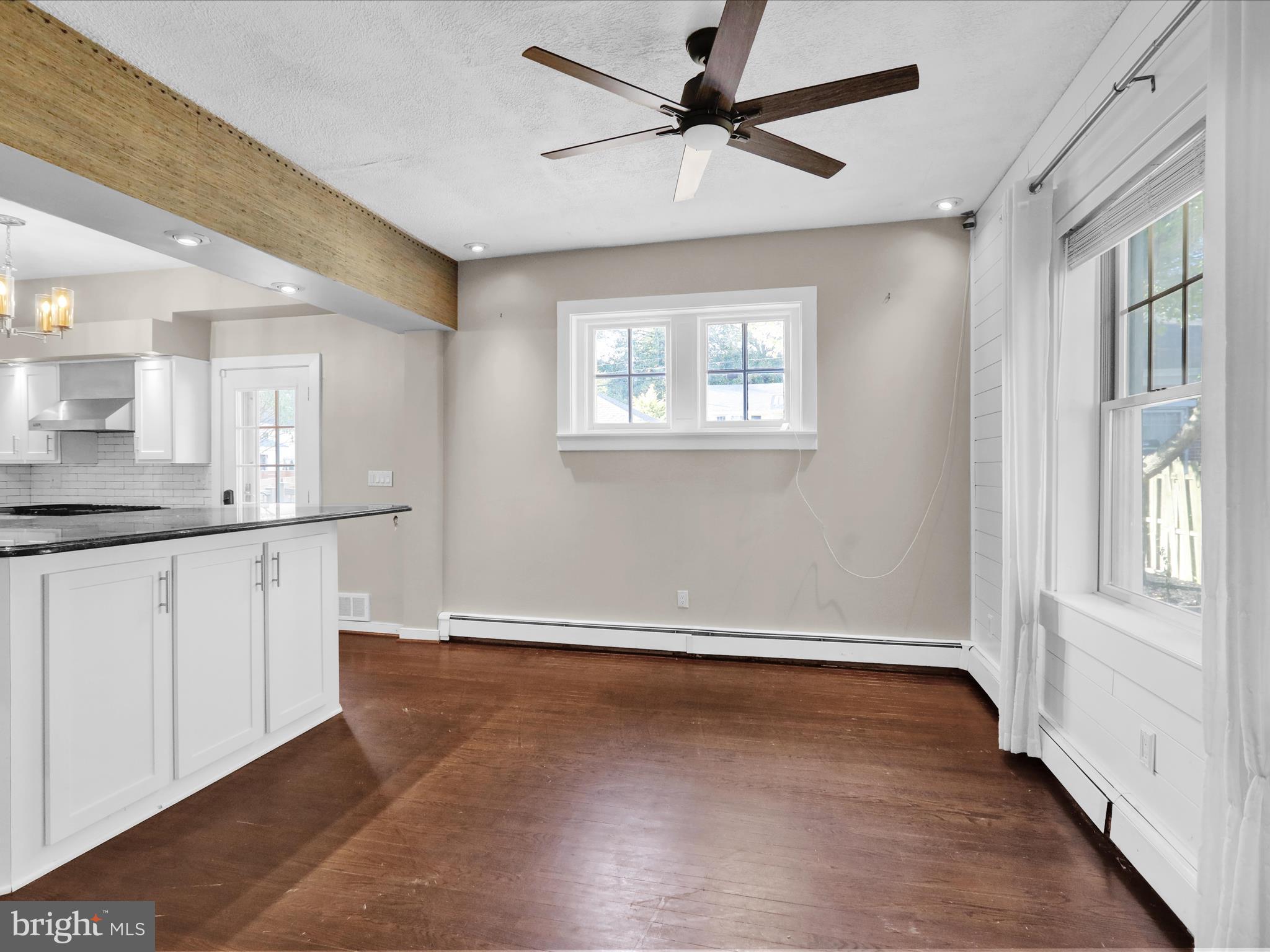 1315 Cleveland Avenue Wyomissing, PA 19610 - Photo 8 of 43 a view of an empty room with window and wooden floor
