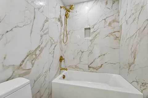 a bathroom with a bathtub