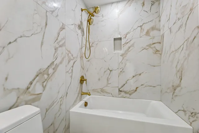 a bathroom with a bathtub