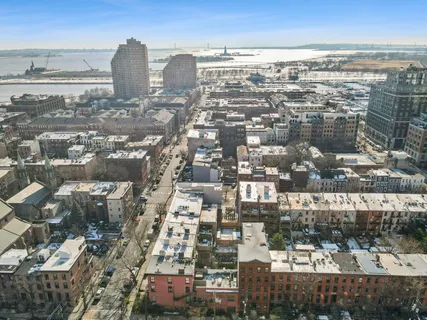 a view of a city with tall buildings