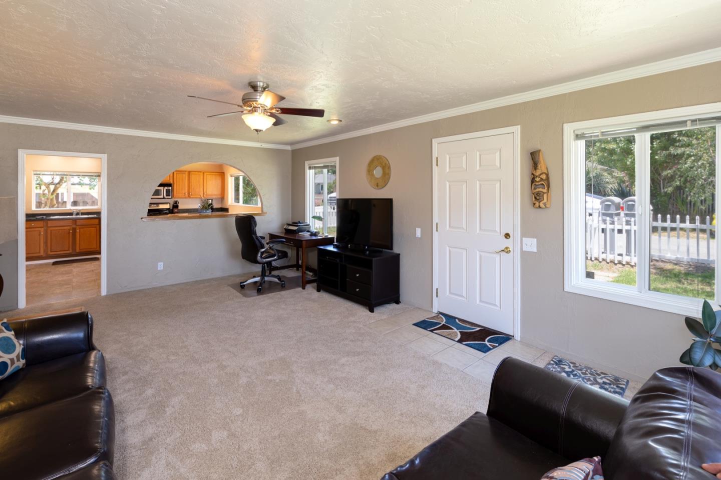 11 Heiner Road Watsonville, CA 95076 - Photo 8 of 21 a living room with furniture and a flat screen tv