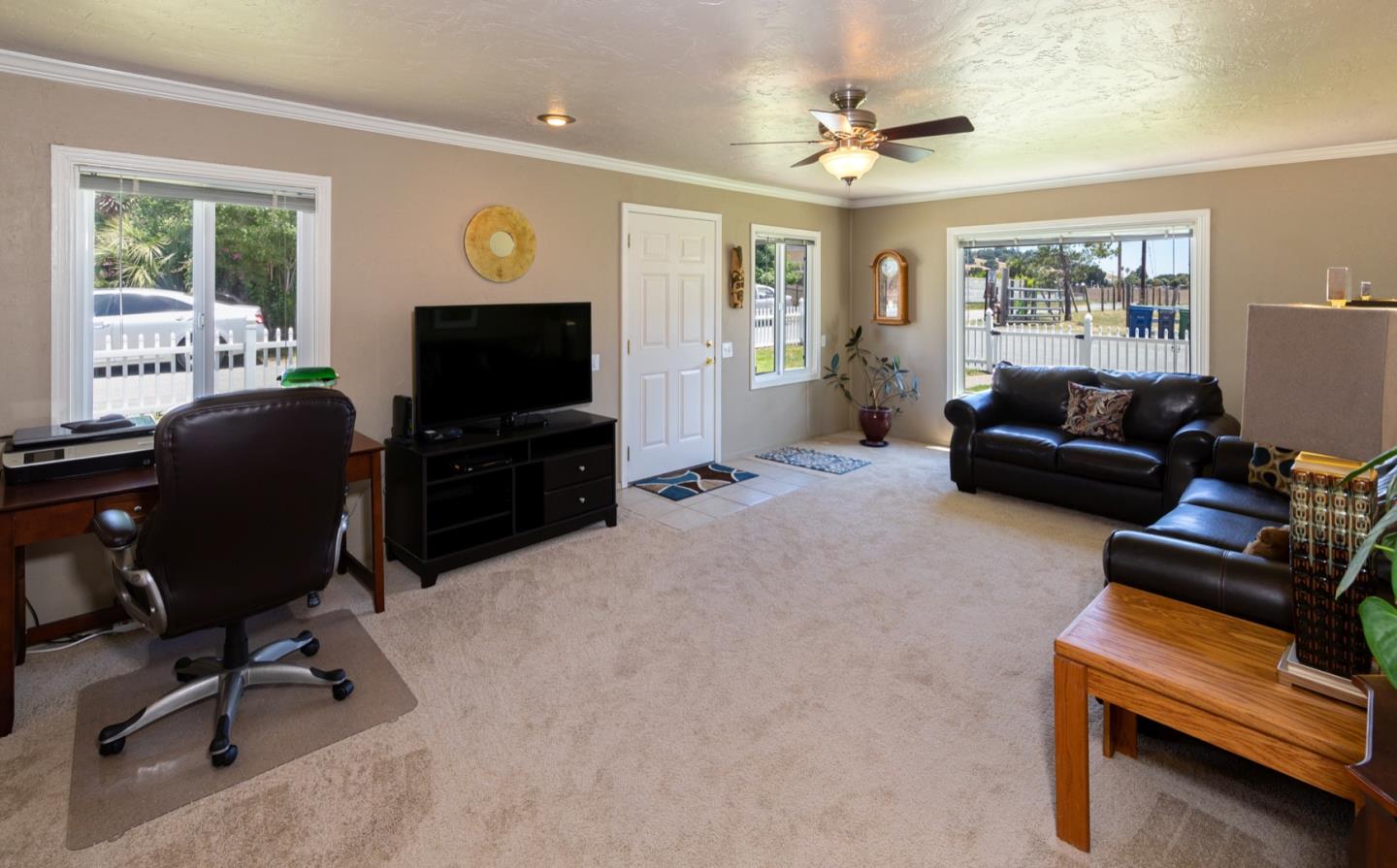 11 Heiner Road Watsonville, CA 95076 - Photo 9 of 21 a living room with furniture and a flat screen tv