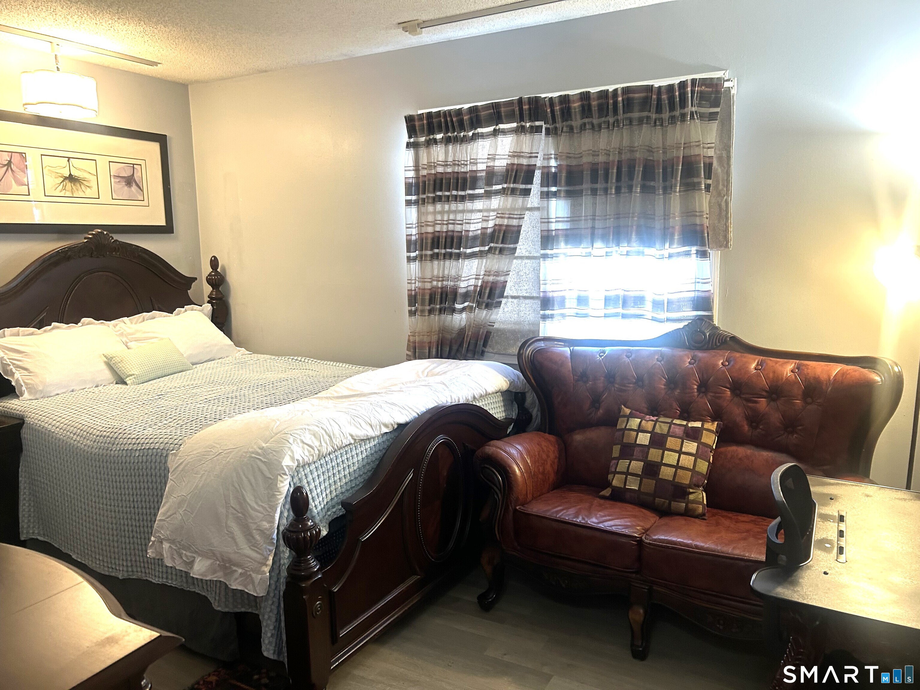 135 Pheasant Road West Haven, CT 06516 - Photo 11 of 23 a bedroom with a bed and window
