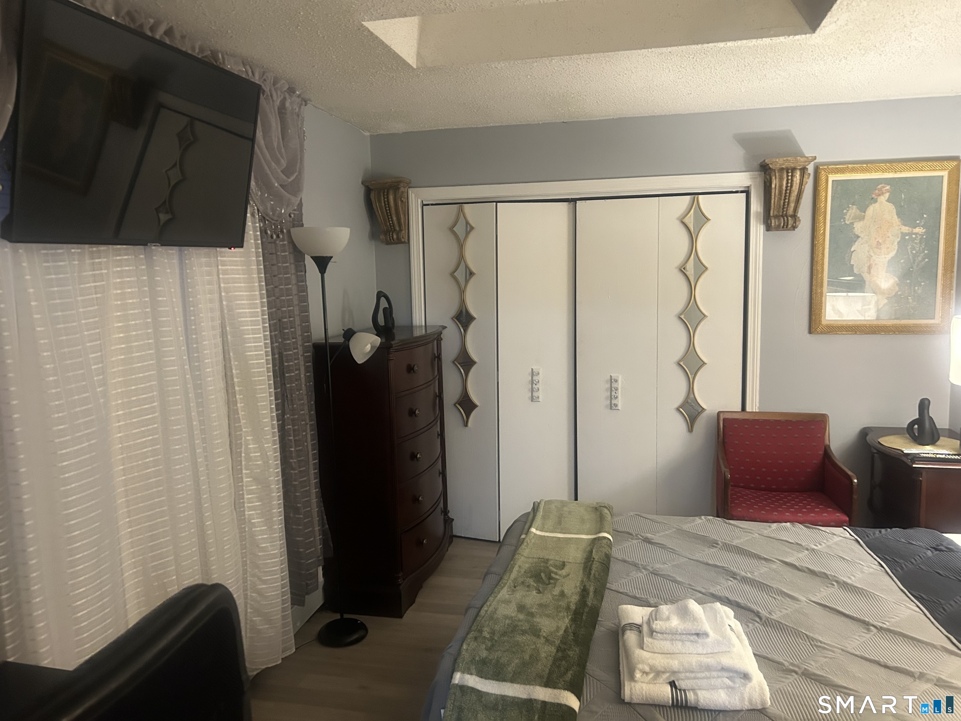 135 Pheasant Road West Haven, CT 06516 - Photo 12 of 23 a bedroom with a bed and a window