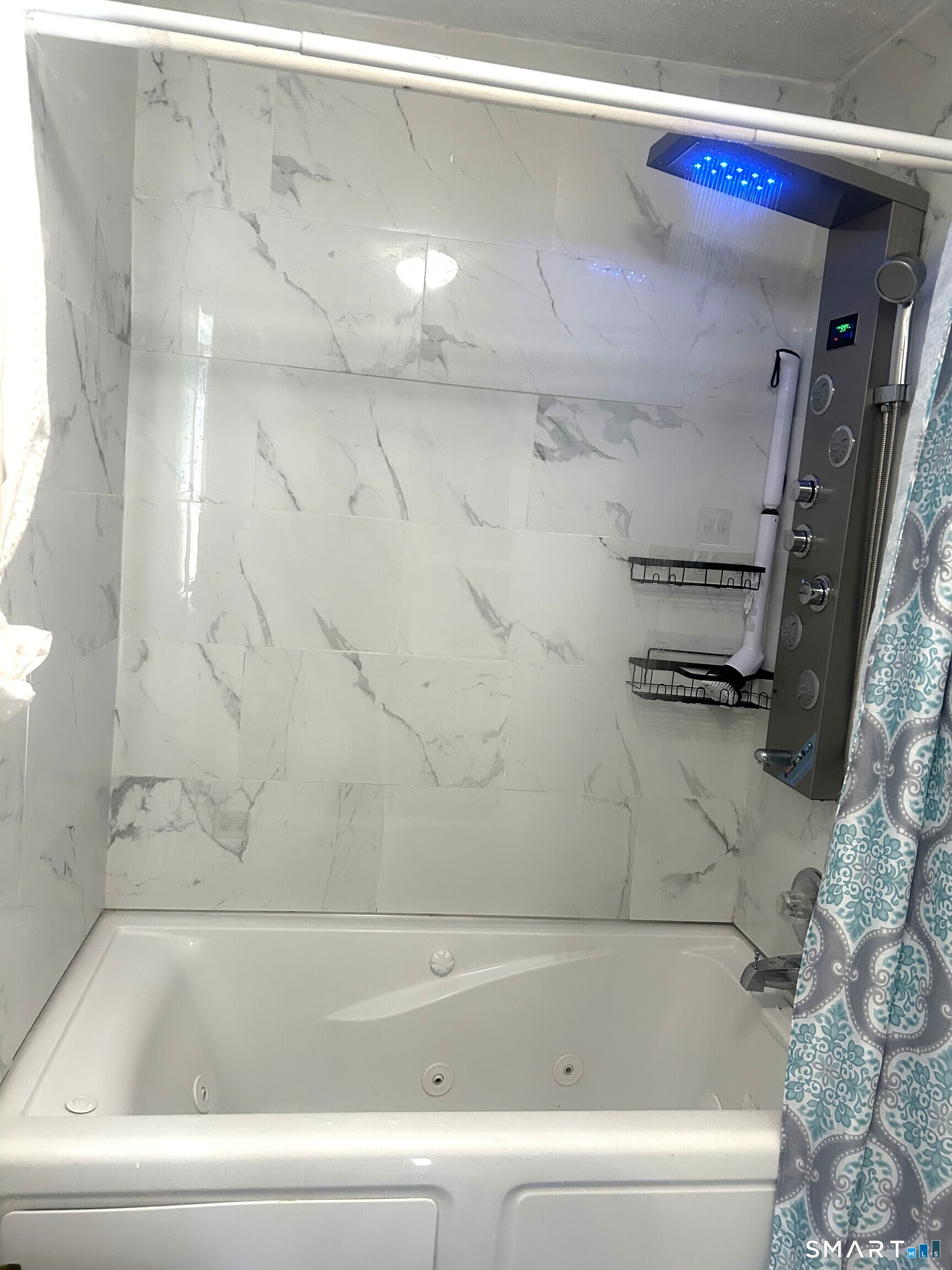 135 Pheasant Road West Haven, CT 06516 - Photo 20 of 23 a bathroom with a bathtub and a shower