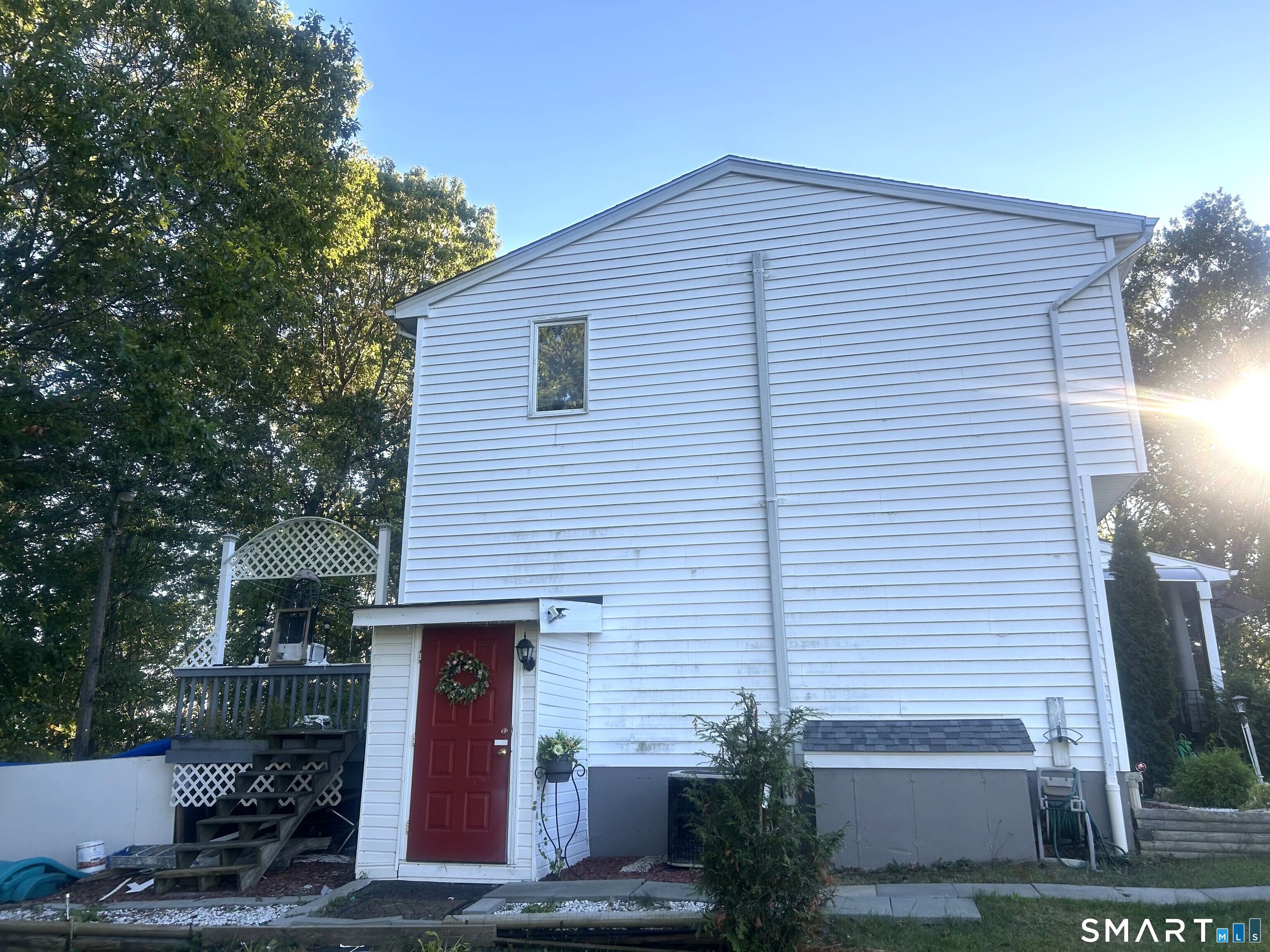 135 Pheasant Road West Haven, CT 06516 - Photo 5 of 23 a front view of a house with garden