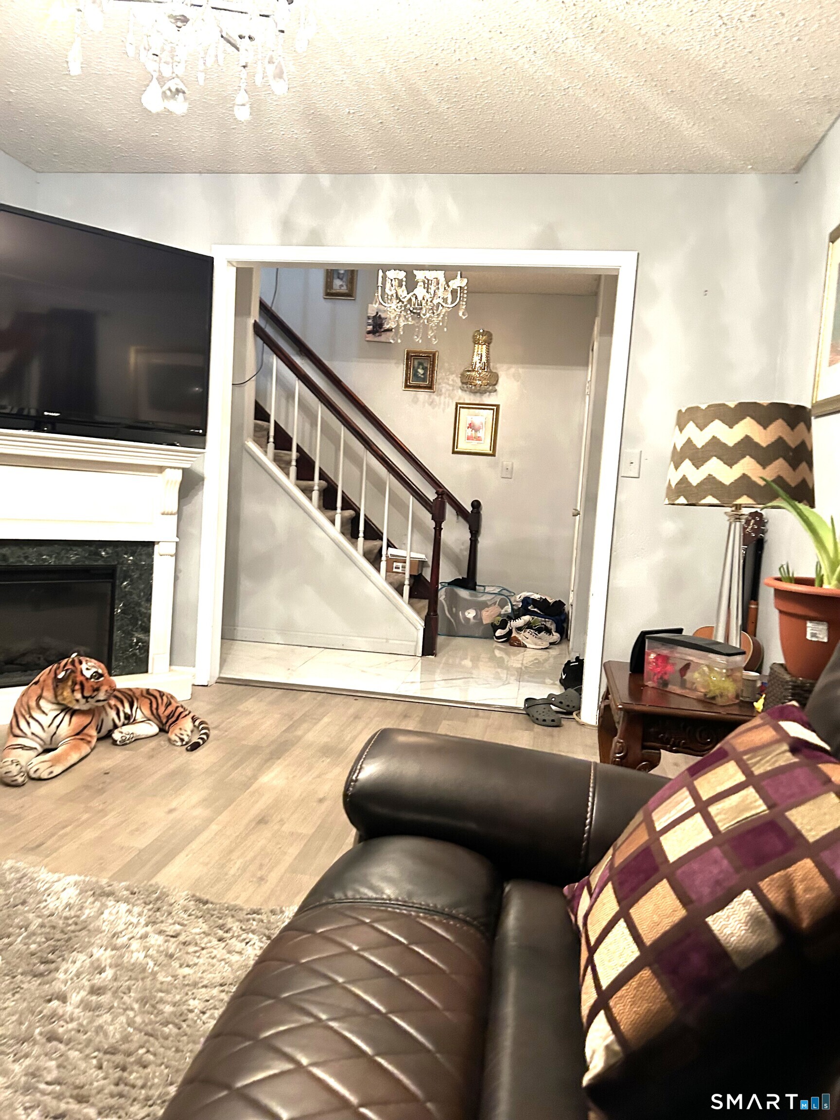 135 Pheasant Road West Haven, CT 06516 - Photo 8 of 23 a view of a living room and dining room