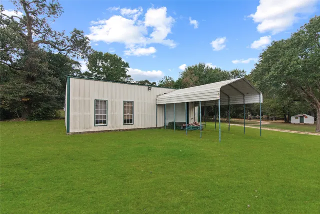a view of parking garage with cars