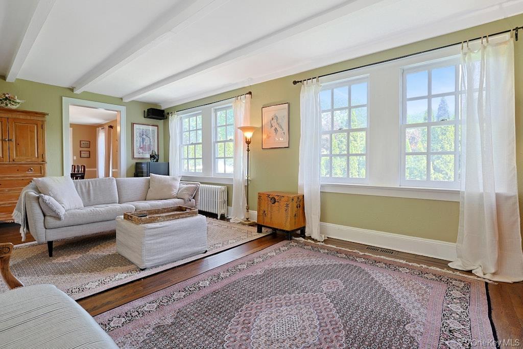 97 Underhill Road Scarsdale, NY 10583 - Photo 13 of 39 a living room with furniture and a window