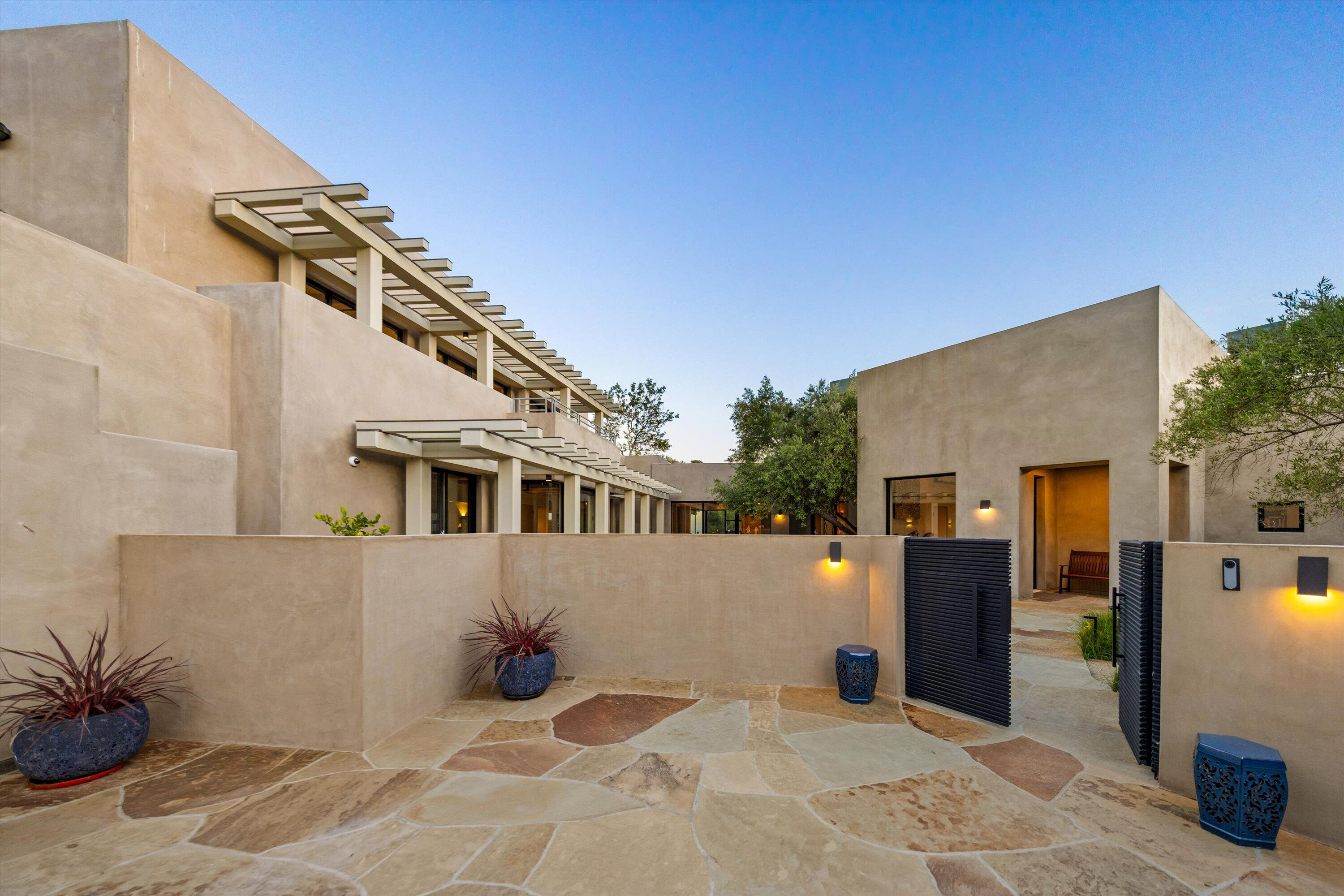 892 Toro Canyon Road Montecito, CA 93108 - Photo 7 of 40 a view of a house with backyard and sitting area