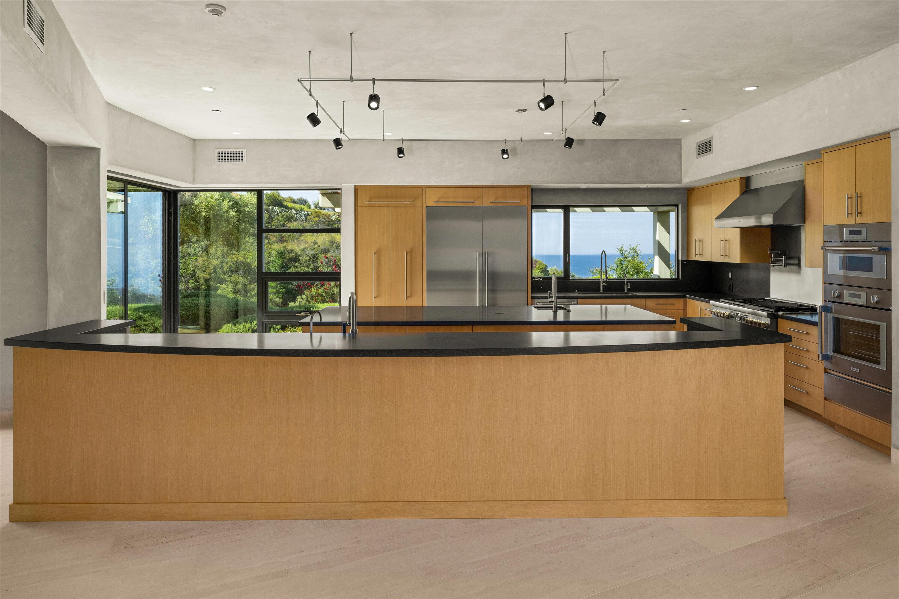 892 Toro Canyon Road Montecito, CA 93108 - Photo 8 of 40 a living room with large window