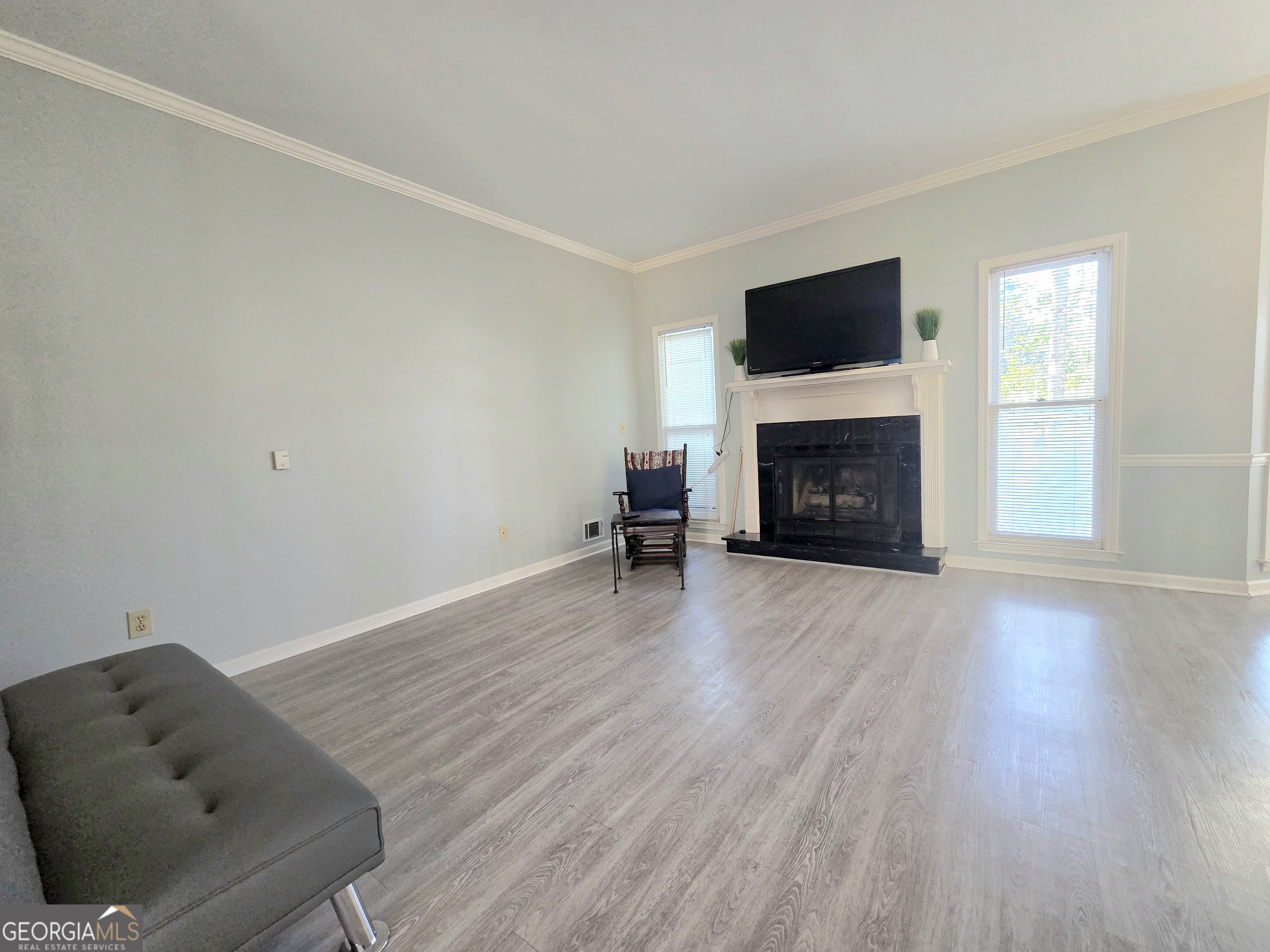 1426 Cambridge Common Decatur, GA 30033 - Photo 11 of 51 a living room with furniture and a fireplace