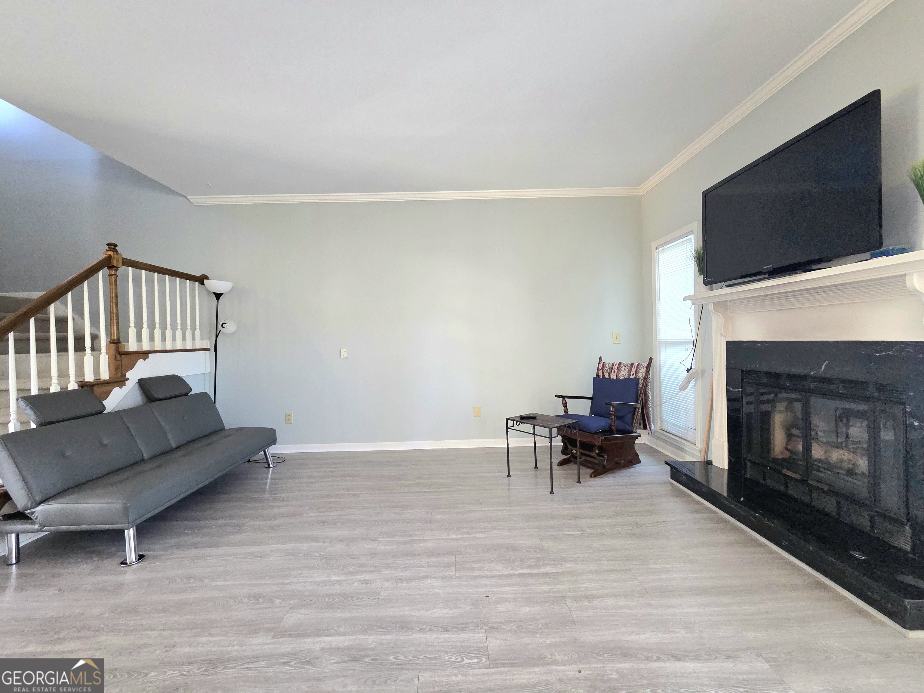 1426 Cambridge Common Decatur, GA 30033 - Photo 12 of 51 a living room with furniture and a fireplace