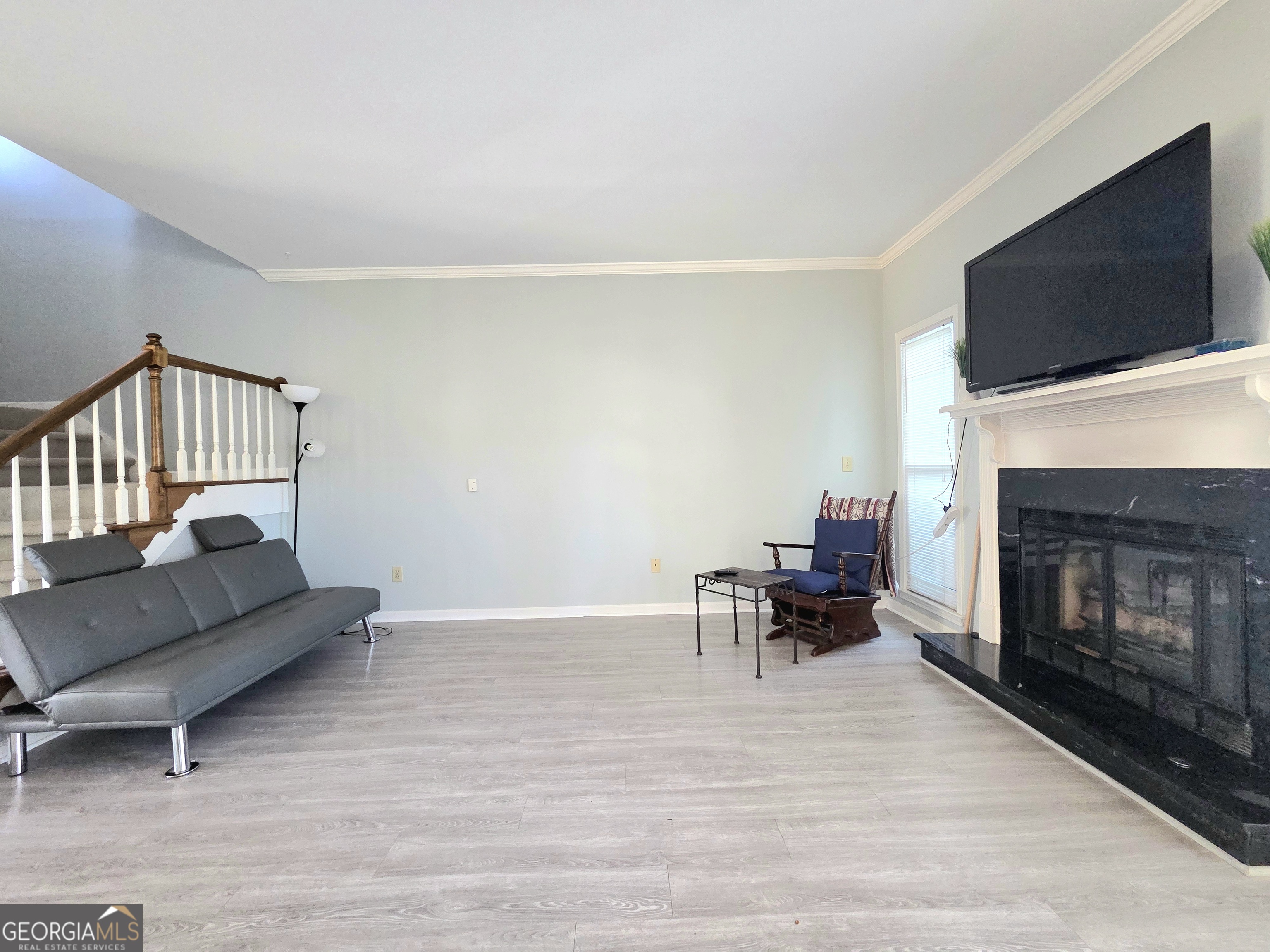 1426 Cambridge Common Decatur, GA 30033 - Photo 13 of 51 a living room with furniture and a fireplace