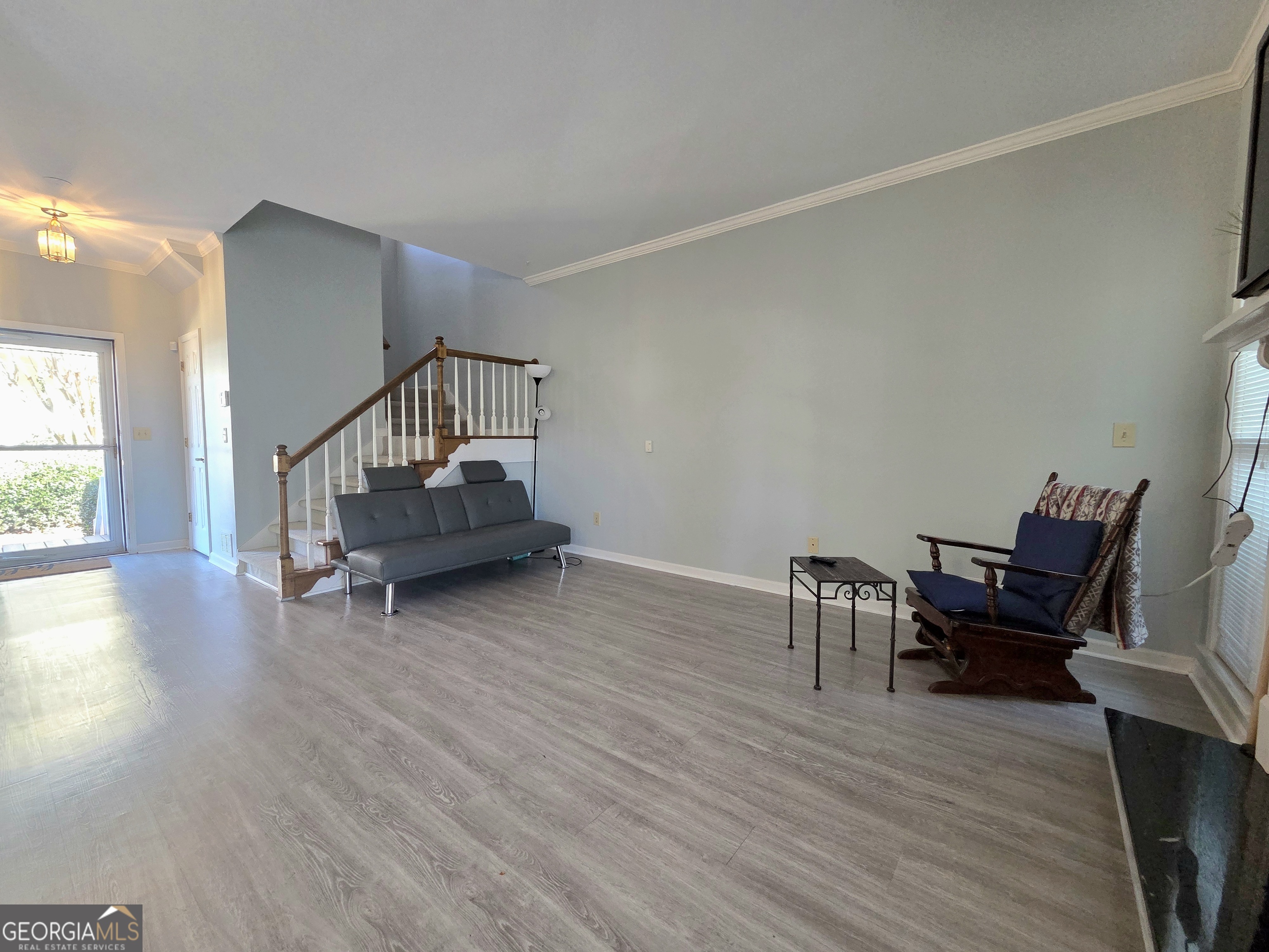 1426 Cambridge Common Decatur, GA 30033 - Photo 14 of 51 a living room with furniture and a wooden floor