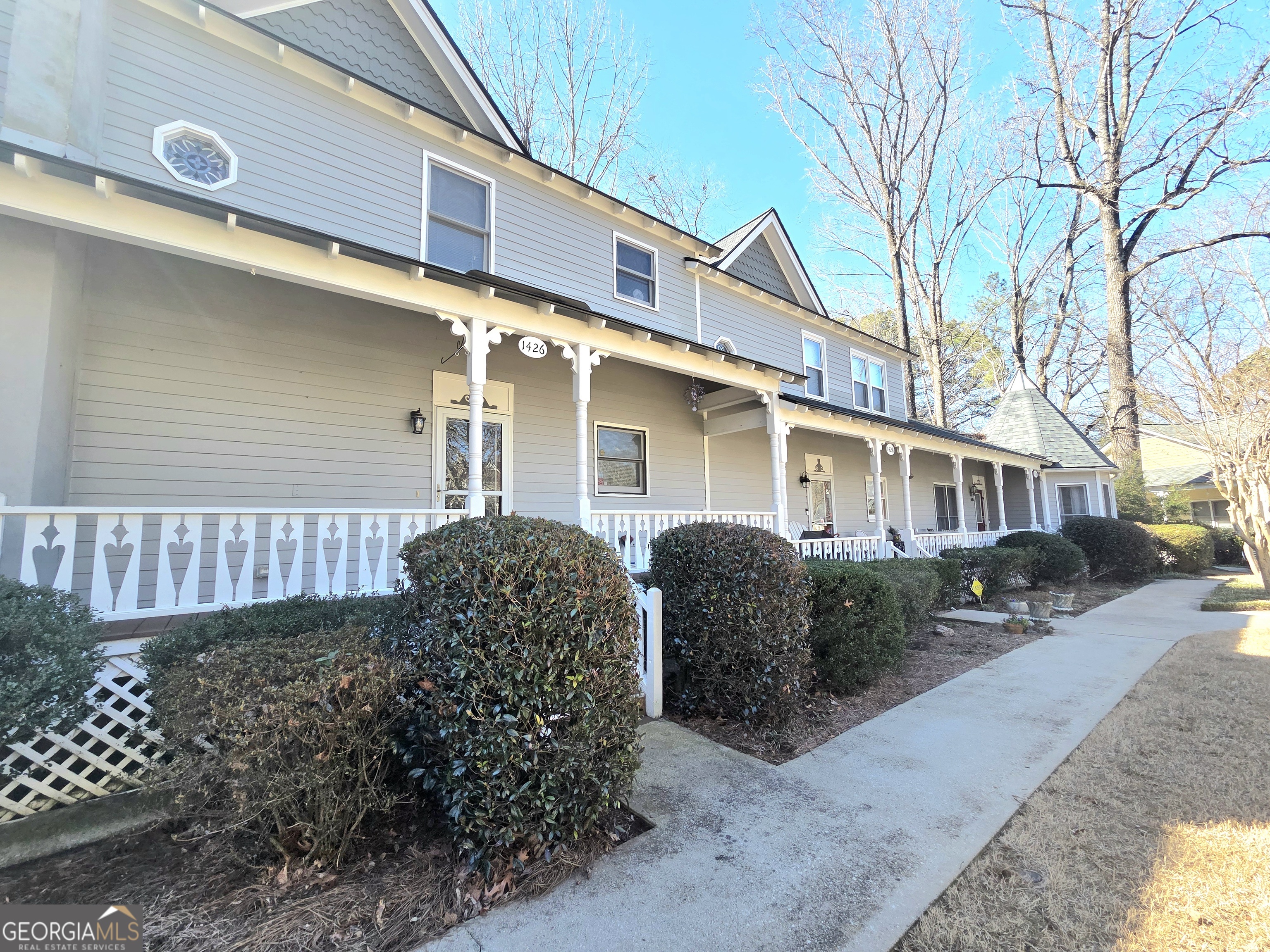 1426 Cambridge Common Decatur, GA 30033 - Photo 2 of 51 a front view of a house with garden