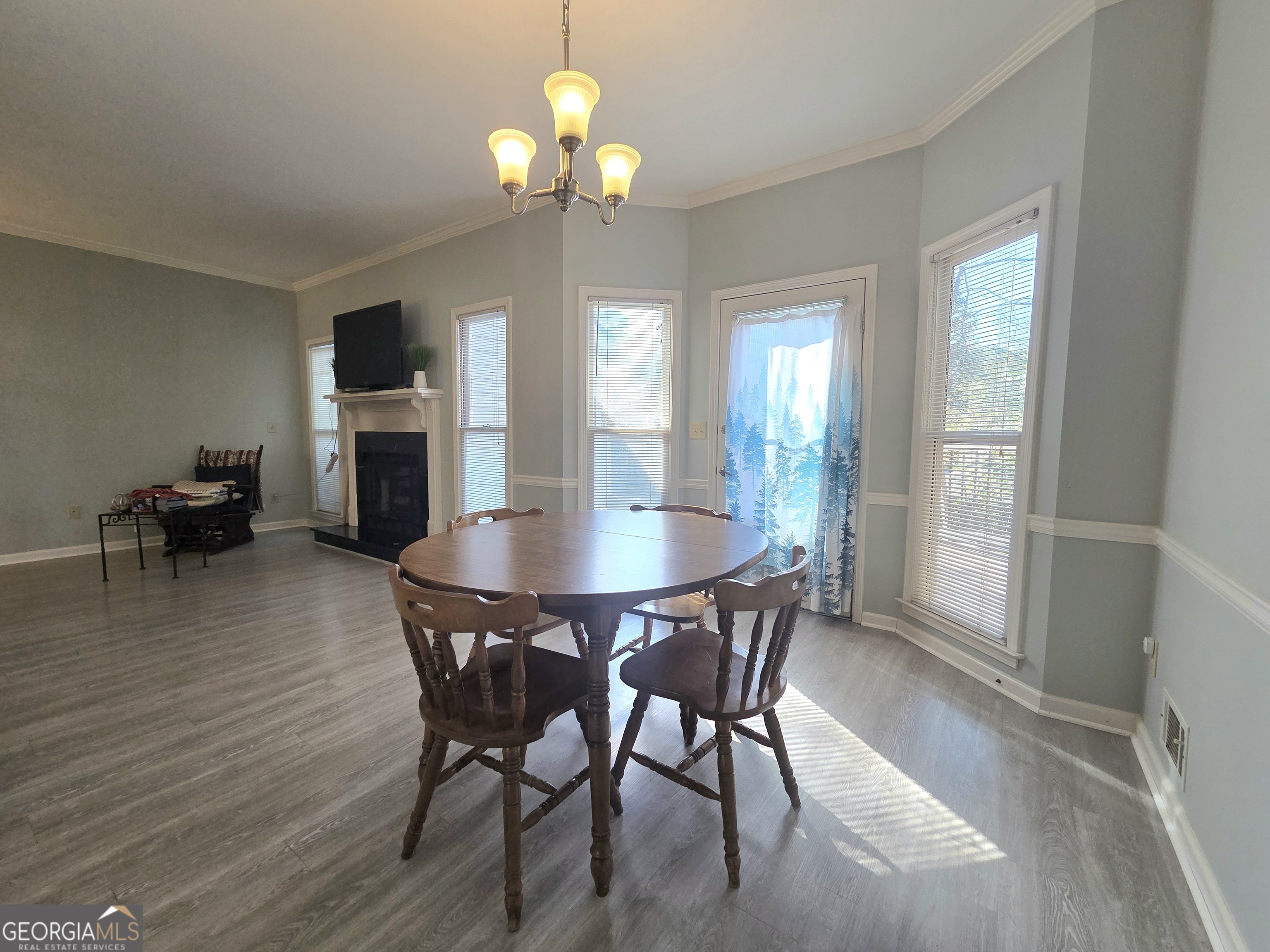 1426 Cambridge Common Decatur, GA 30033 - Photo 24 of 51 a view of a dining room with furniture and wooden floor