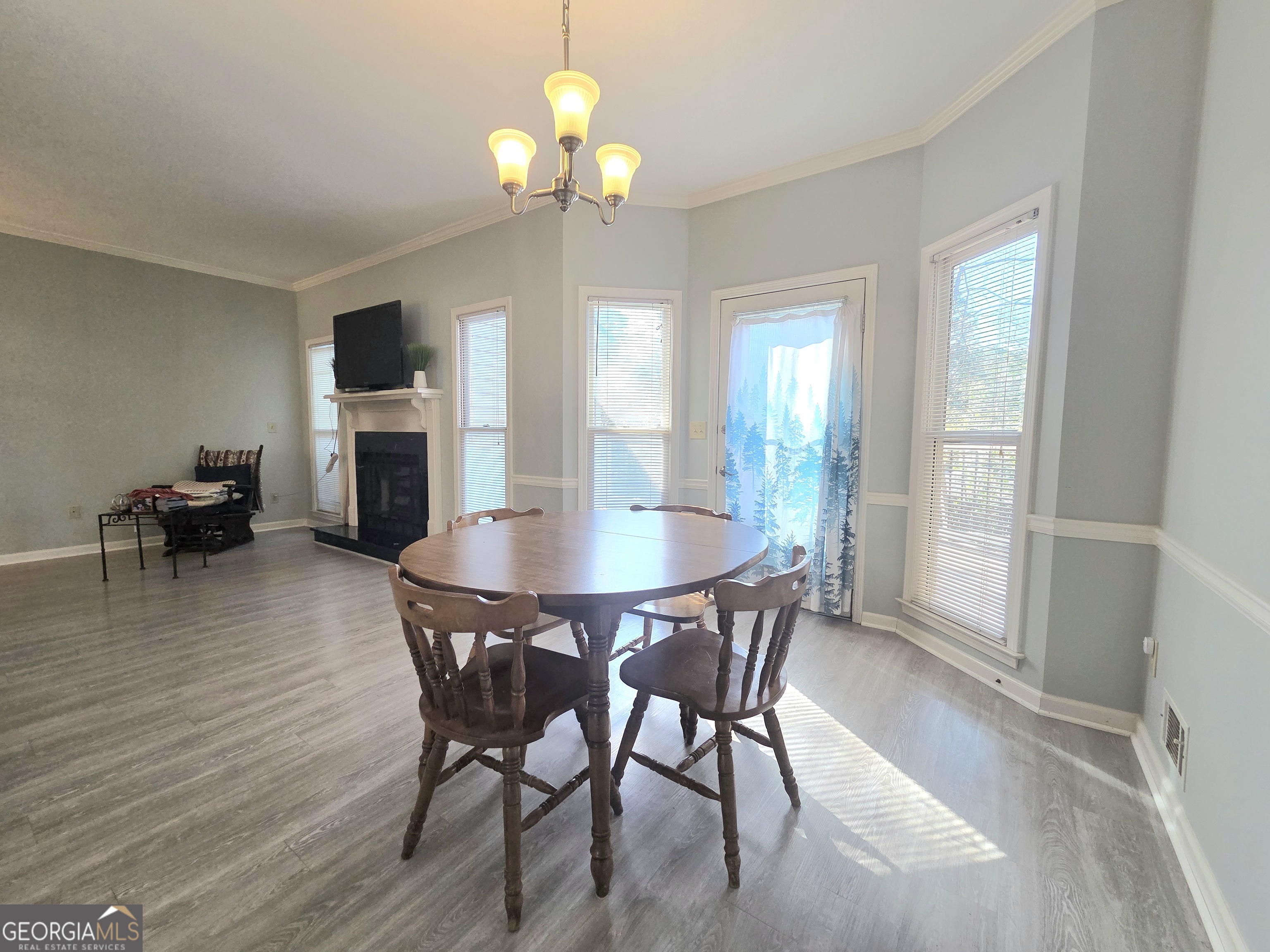 1426 Cambridge Common Decatur, GA 30033 - Photo 25 of 51 a view of a dining room with furniture and wooden floor