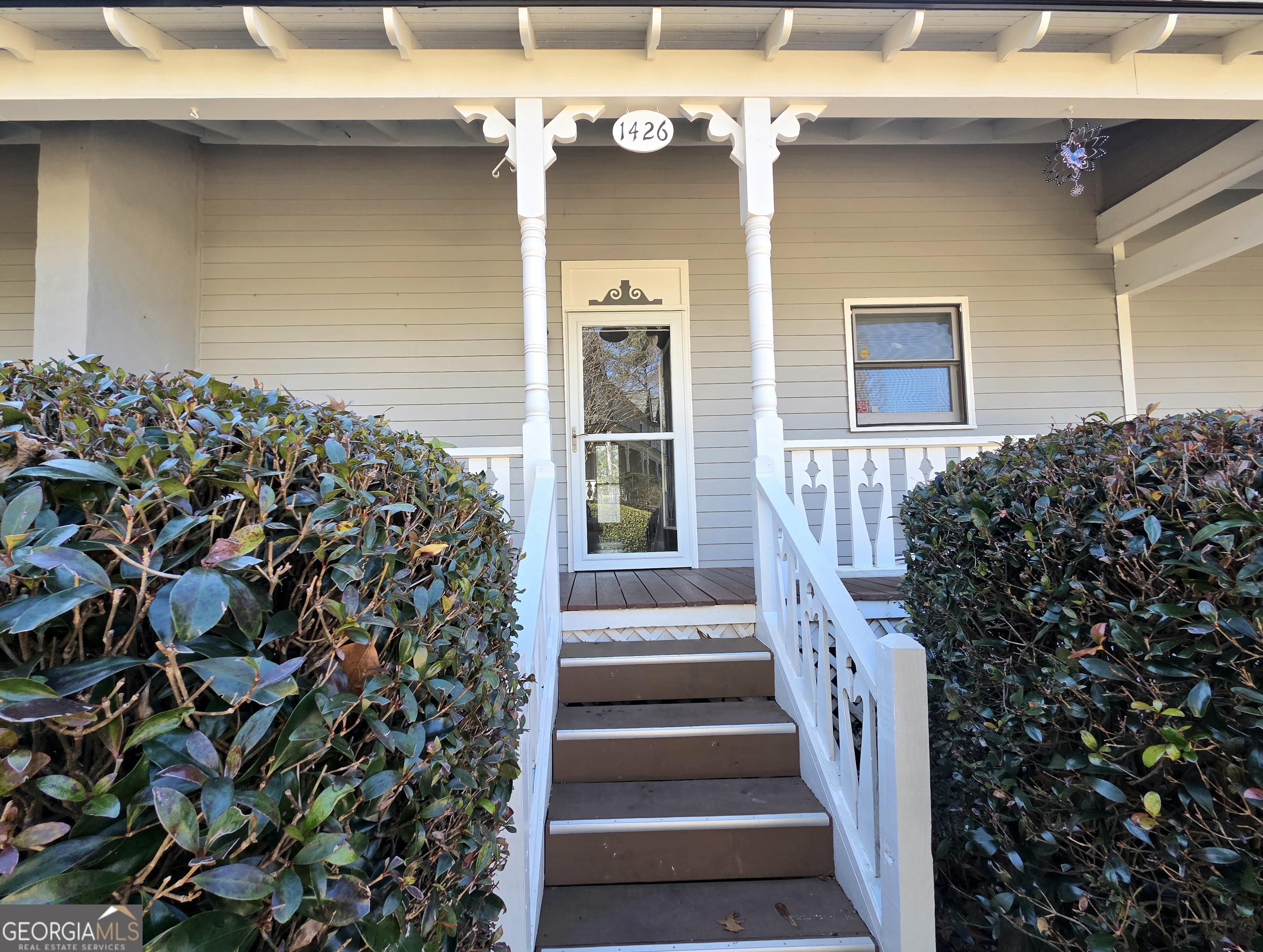 1426 Cambridge Common Decatur, GA 30033 - Photo 3 of 51 a front view of a house with a garden