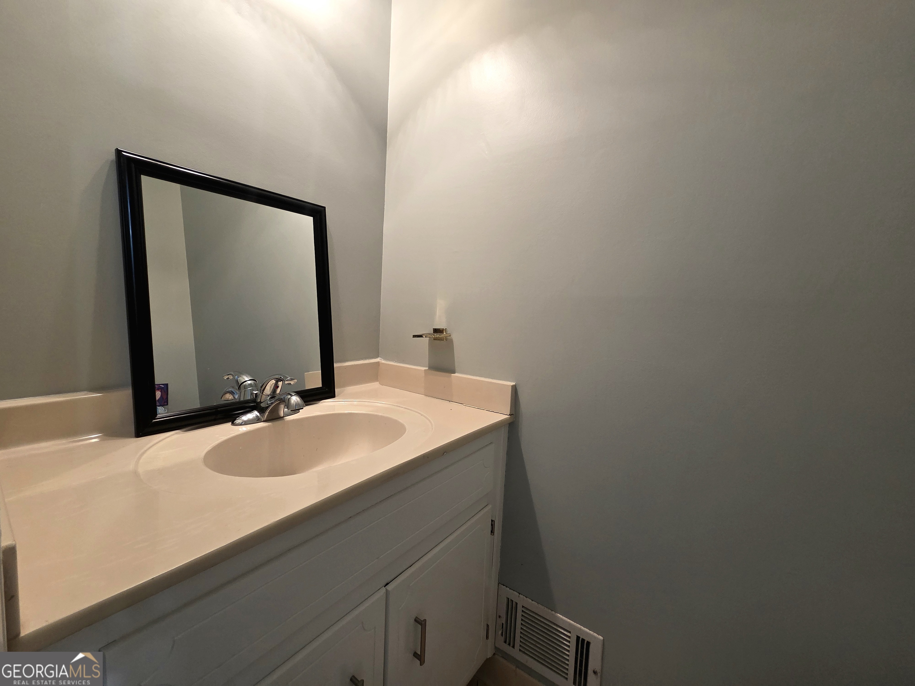 1426 Cambridge Common Decatur, GA 30033 - Photo 40 of 51 a bathroom with a sink and a mirror