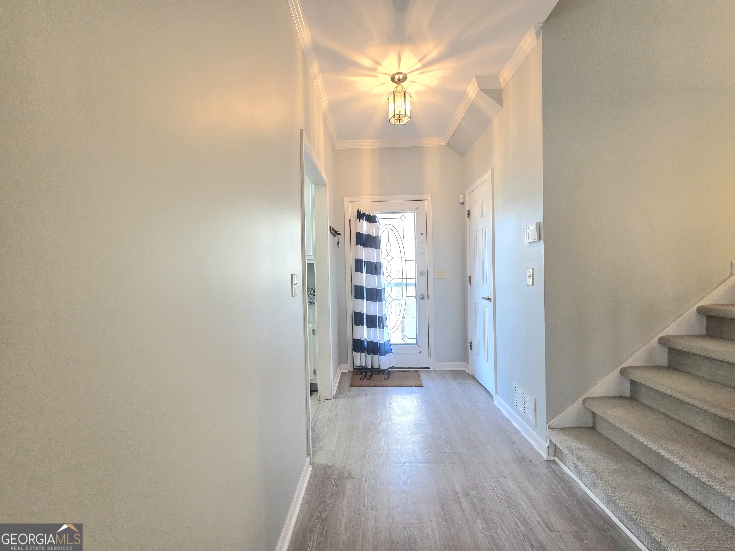 1426 Cambridge Common Decatur, GA 30033 - Photo 43 of 51 a view of a hallway with wooden floor and workspace