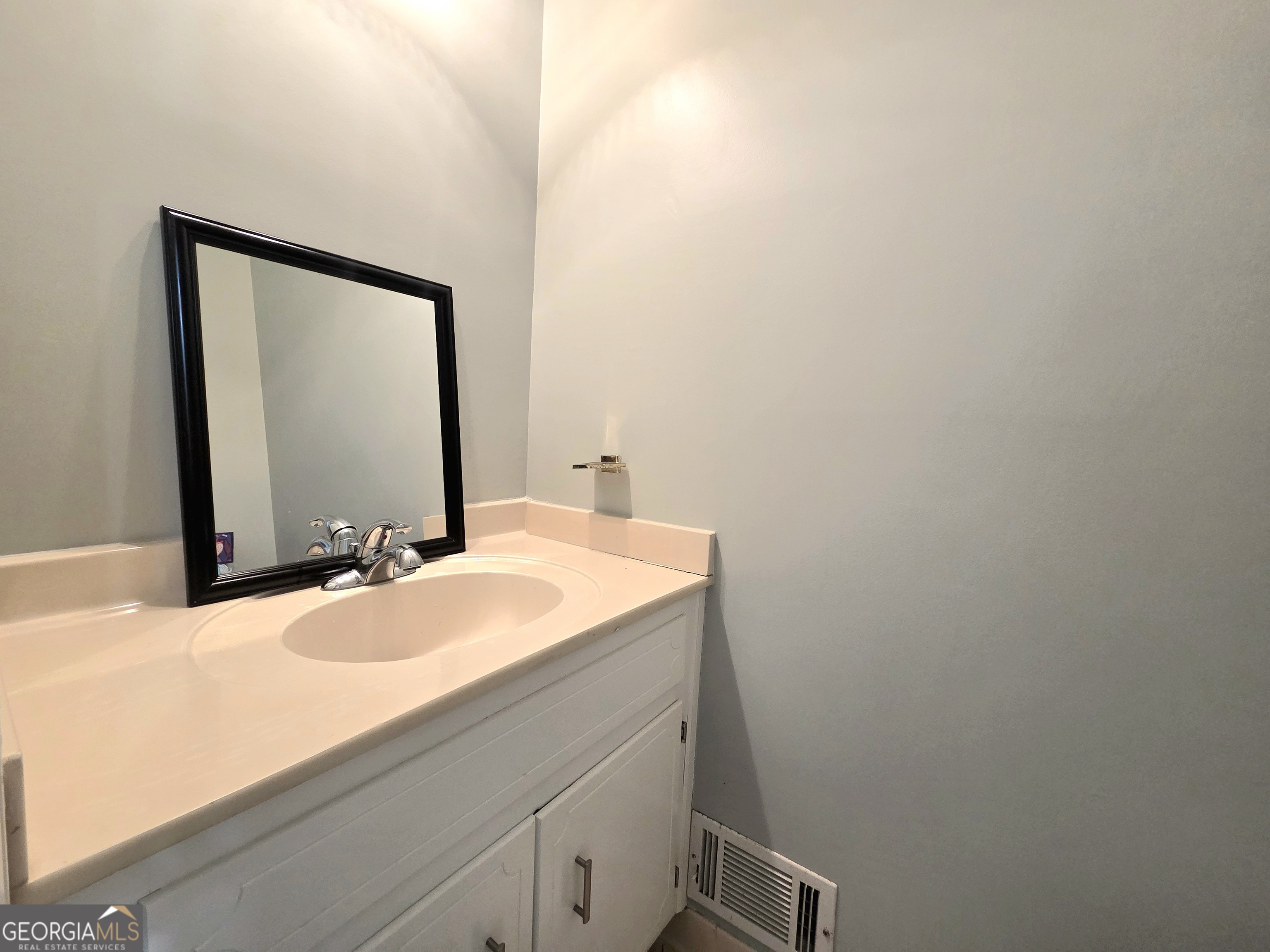 1426 Cambridge Common Decatur, GA 30033 - Photo 44 of 51 a bathroom with a sink and a mirror