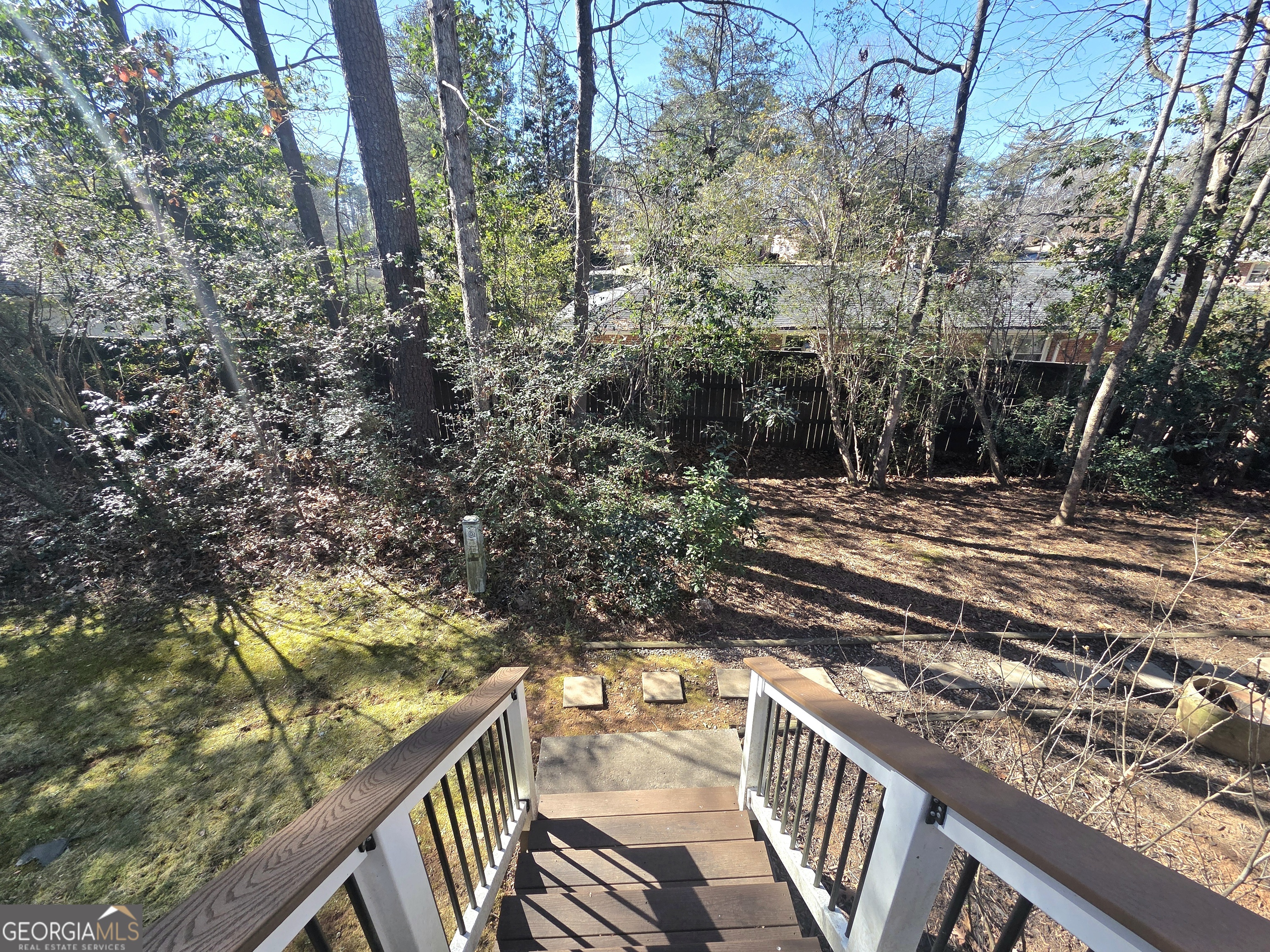 1426 Cambridge Common Decatur, GA 30033 - Photo 47 of 51 a view of a wooden deck with trees
