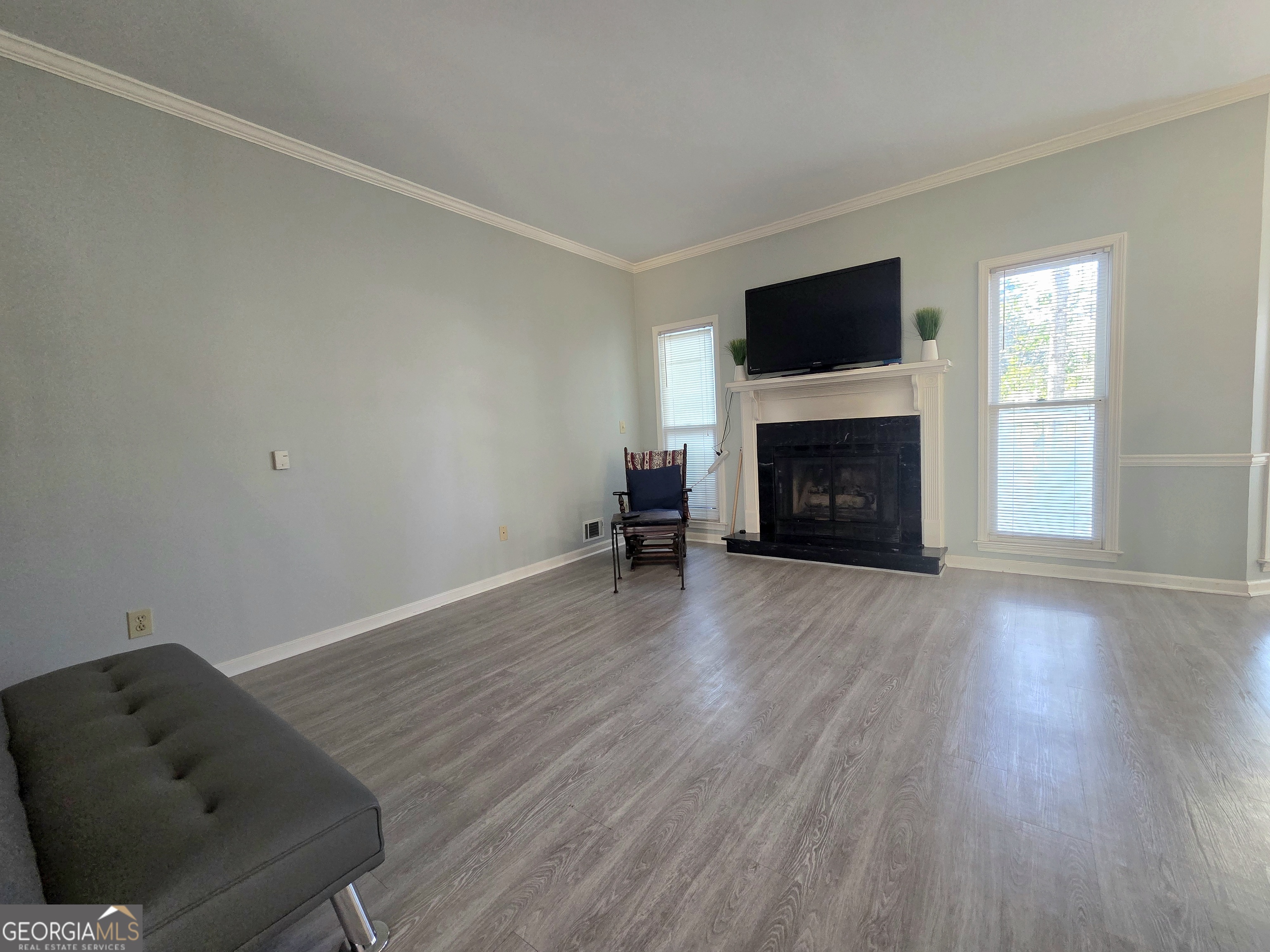 1426 Cambridge Common Decatur, GA 30033 - Photo 8 of 51 a living room with furniture and a fireplace