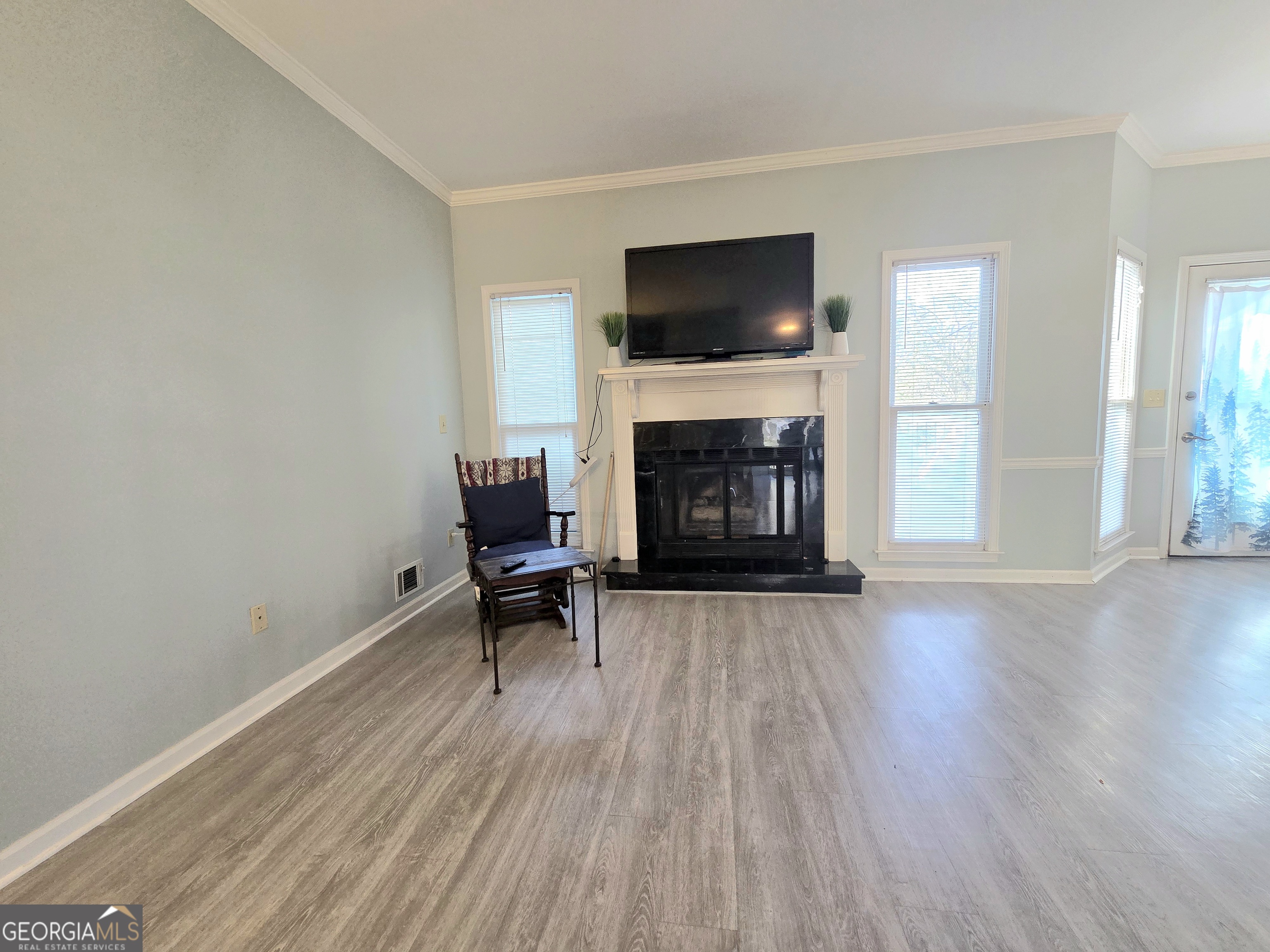 1426 Cambridge Common Decatur, GA 30033 - Photo 9 of 51 a living room with furniture and a fireplace