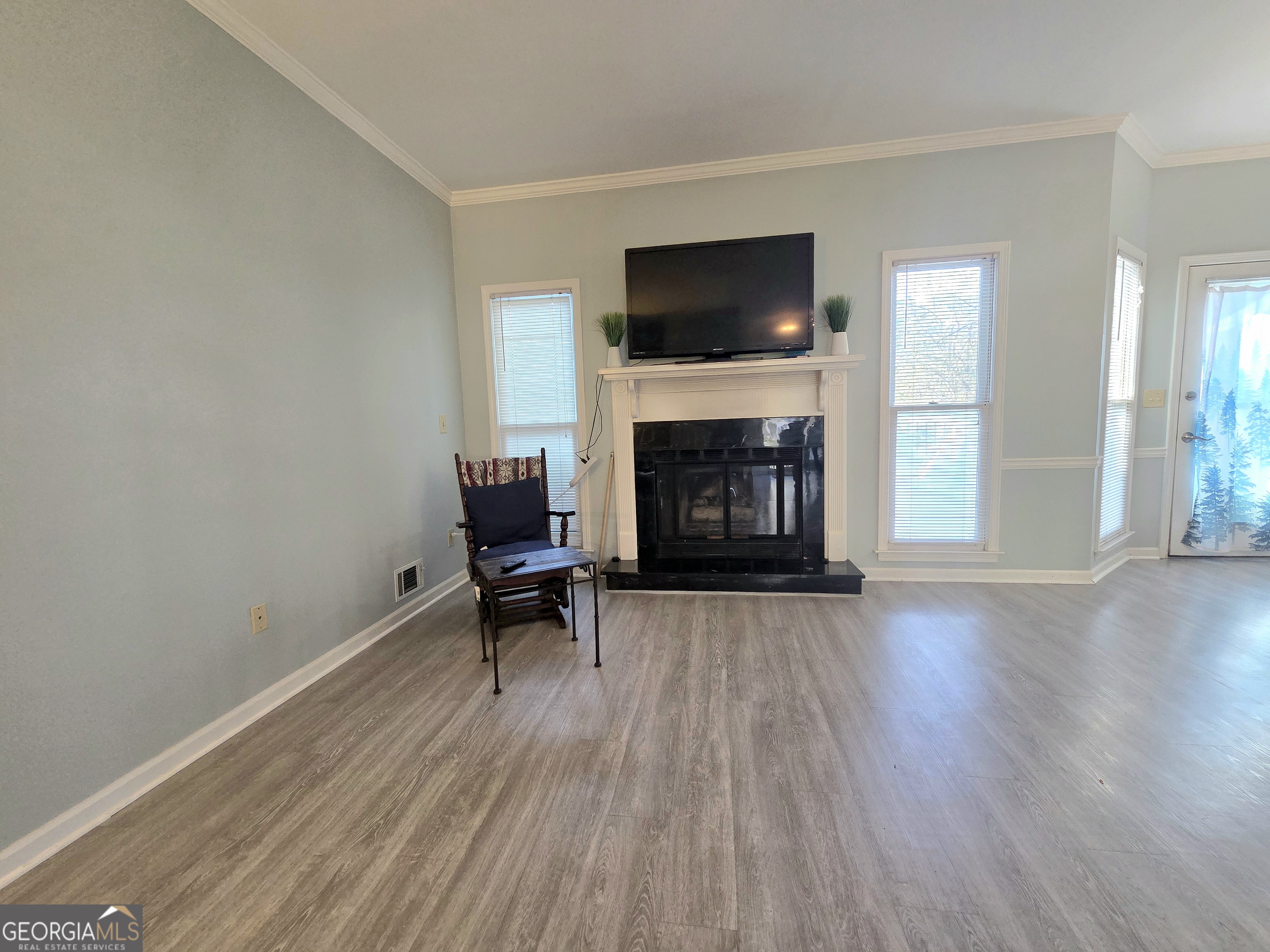 1426 Cambridge Common Decatur, GA 30033 - Photo 10 of 51 a living room with furniture and a fireplace