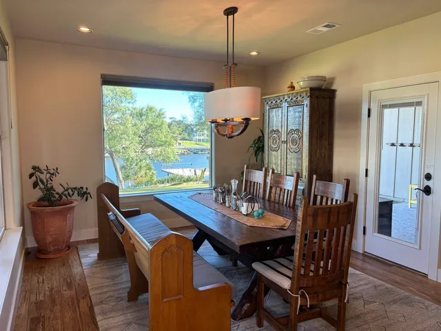a view of a backyard with sitting area