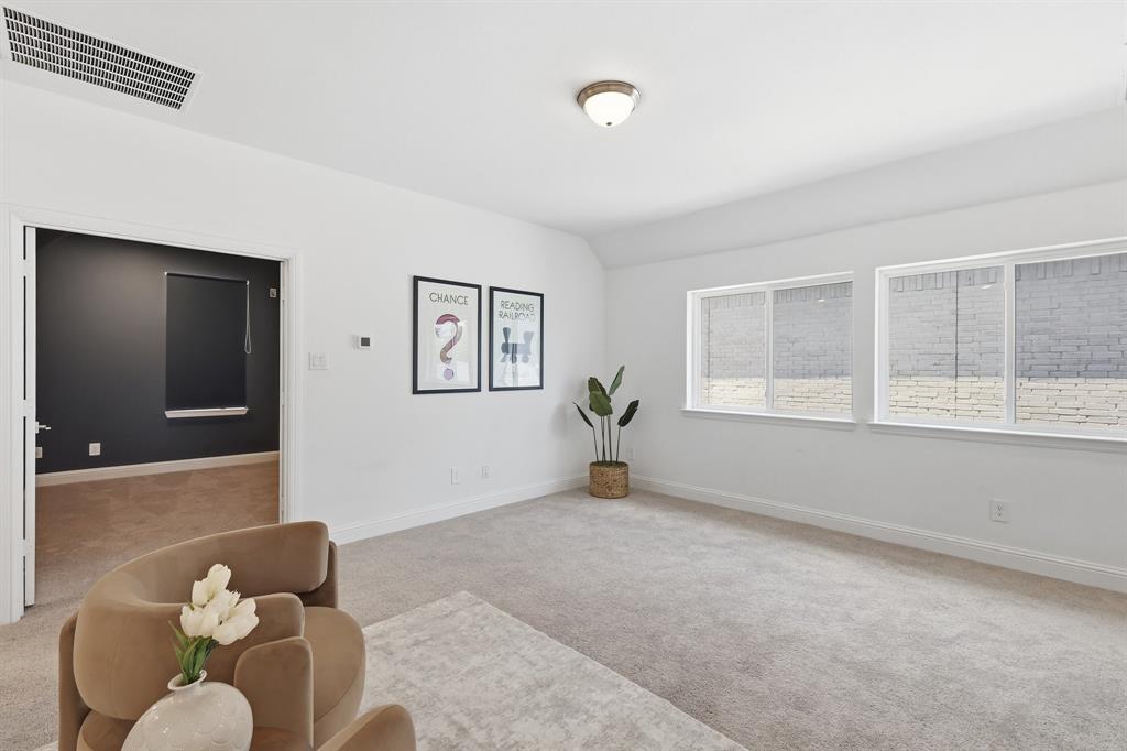 539 Farrell Lane Allen, TX 75013 - Photo 20 of 39 Spacious room with light gray carpeting, crisp white walls, and a recessed ceiling light fixture