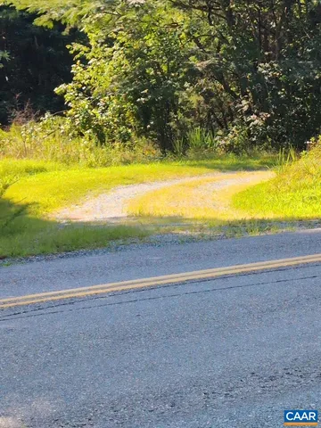 a view of a field with an outdoor space