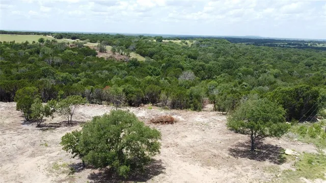 a view of a pathway with a yard