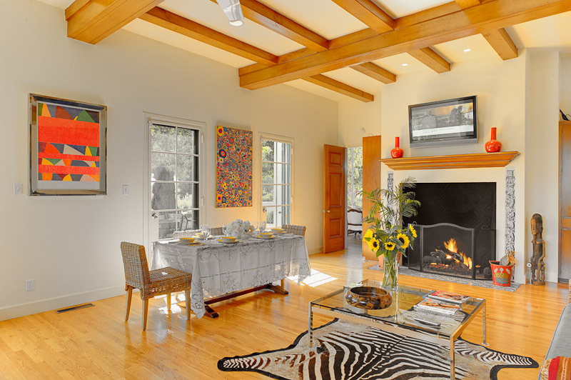 7200 Casitas Pass Road Carpinteria, CA 93013 - Photo 6 of 29 a living room with furniture a flat screen tv and a fireplace