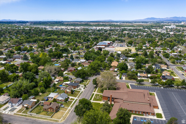 961 33rd Street Ogden, UT 84403 - Photo 36 of 39 Expansive aerial perspective showcasing a residential neighborhood with varied single-story homes, mature trees, and paved streets
