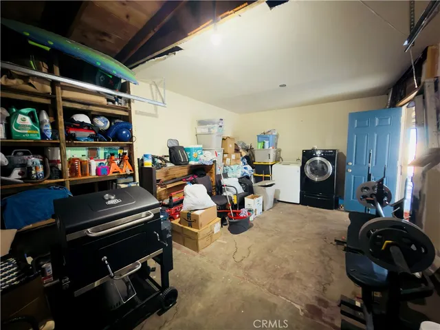 a living room with lots of furniture and a flat screen tv