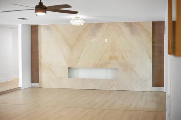 a bathroom with a sink a mirror and a shower