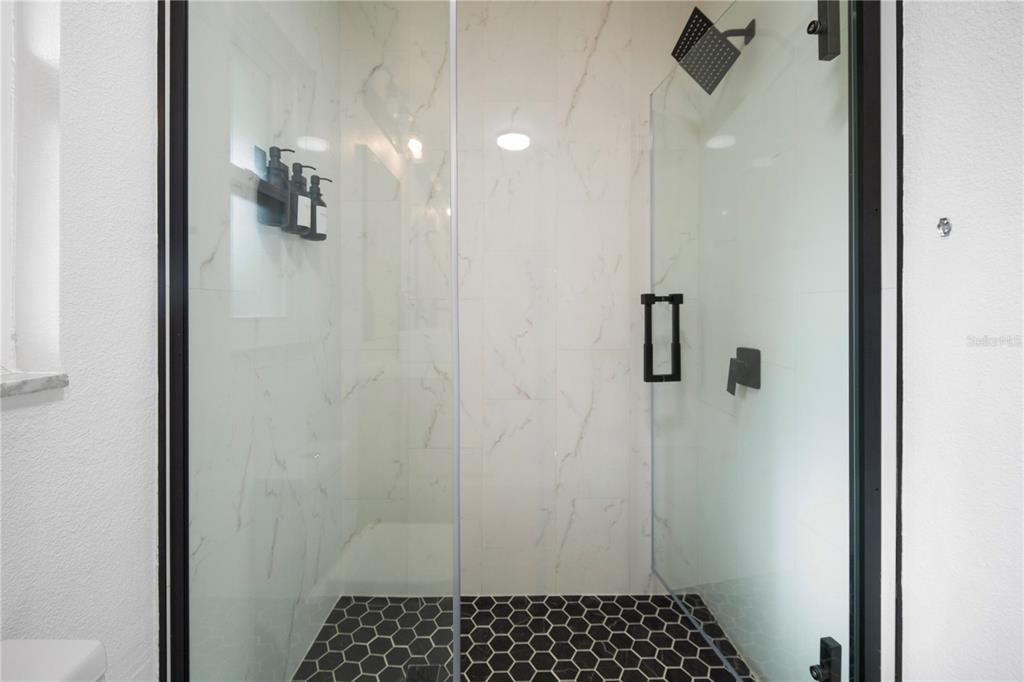 1501 Druid Isle Road Maitland, FL 32751 - Photo 39 of 54 a bathroom with a shower