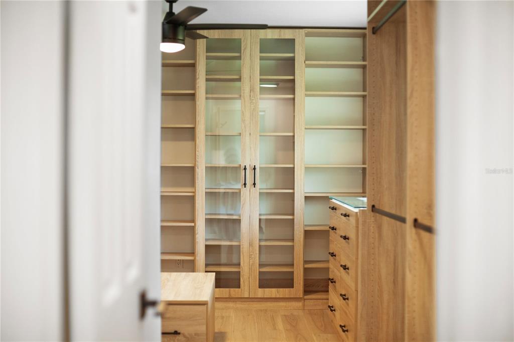 1501 Druid Isle Road Maitland, FL 32751 - Photo 41 of 54 a view of walk in closet with empty racks