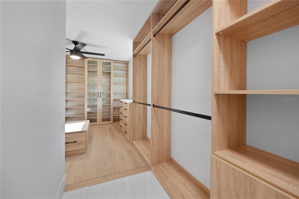 1501 Druid Isle Road Maitland, FL 32751 - Photo 43 of 54 a view of walk in closet with empty racks