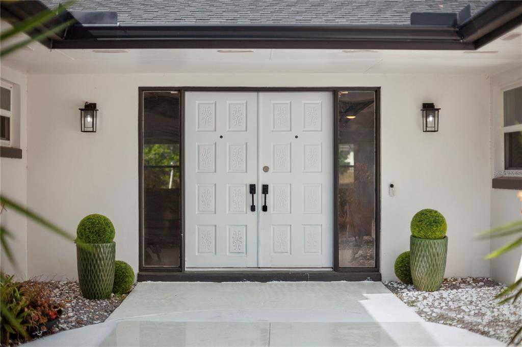 1501 Druid Isle Road Maitland, FL 32751 - Photo 10 of 54 a view of an entryway with table and chair