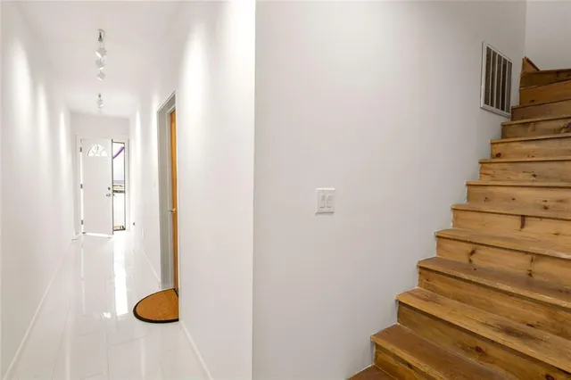 a view of a room with racks on the wall