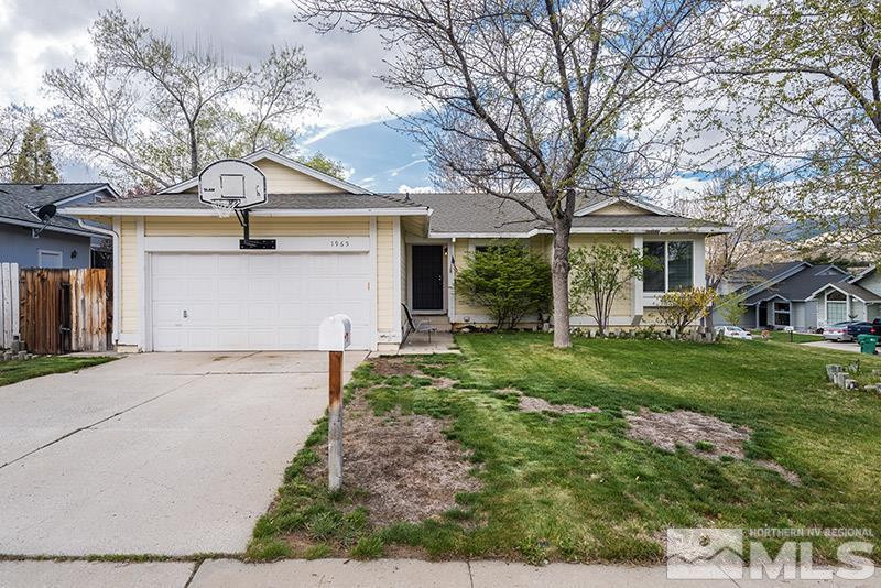 1965 Quail Run Road Reno, NV 89523 - Photo 1 of 1 front view of a house with a yard
