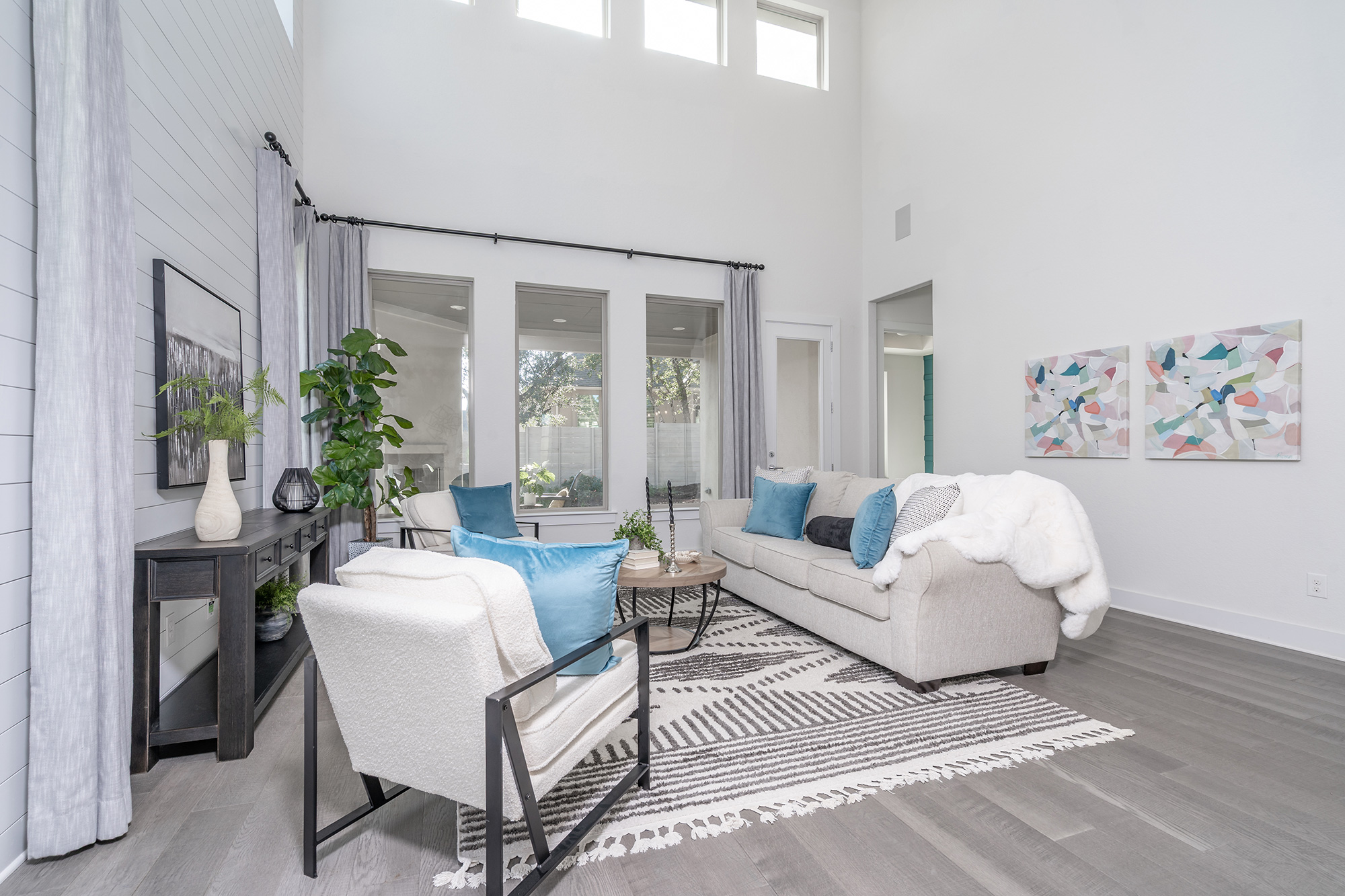 120 Diamondback Drive Georgetown, TX 78628 - Photo 11 of 39 a living room with furniture a table and a potted plant